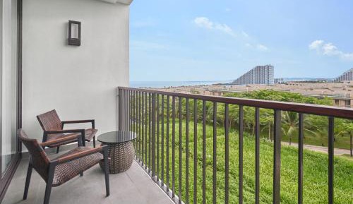 Deluxe Double Room with Two Double Beds and Partial Sea View