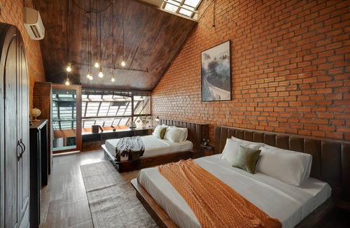 Downtown Ho Chi Minh City House | 4BR Industrial Gem with Rooftop Garden by Bến Thành